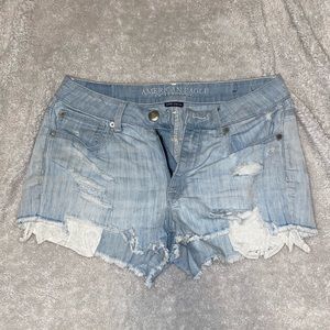 Light distressed denim jean shorts